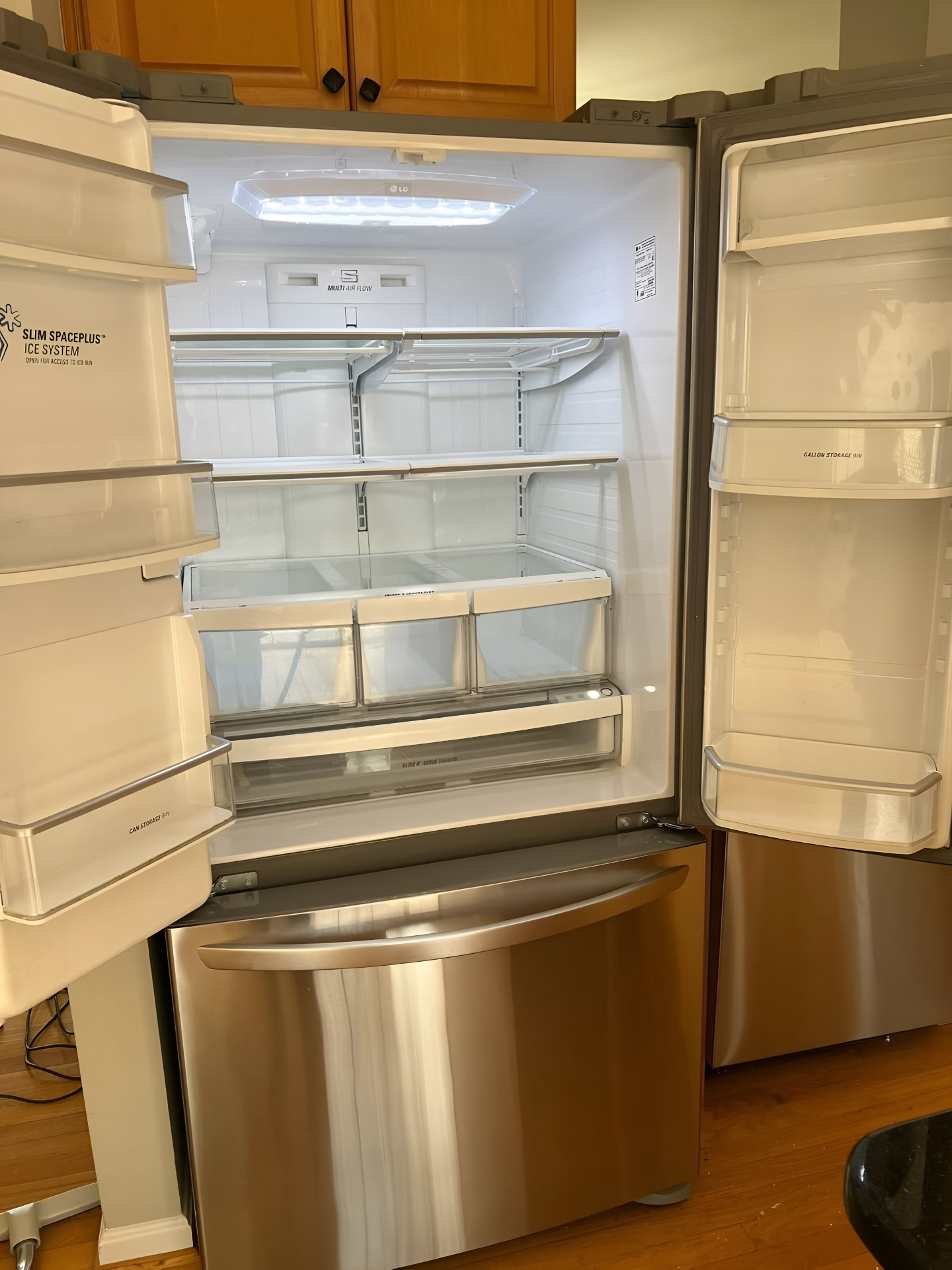 Inside of a cleaned refrigerator by Make It Sparkle LLC Cleaning Service